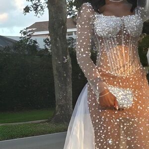 Fully embellished custom made dress w/ trail. Size small.